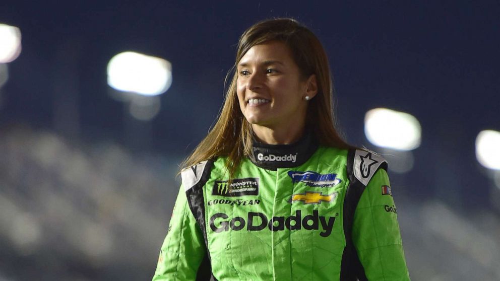 PHOTO: Danica Patrick crosses the stage during driver introductions prior to the start of the Monster Energy NASCAR Cup Series Can-Am Duel 1 at Daytona International Speedway, on Feb. 15, 2018 in Daytona Beach, Fla.