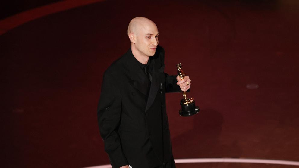 PHOTO:Daniel Blumberg wins the Oscar for Best Original Score for "The Brutalist" during the Oscars show at the 97th Academy Awards in Hollywood, March 2, 2025.