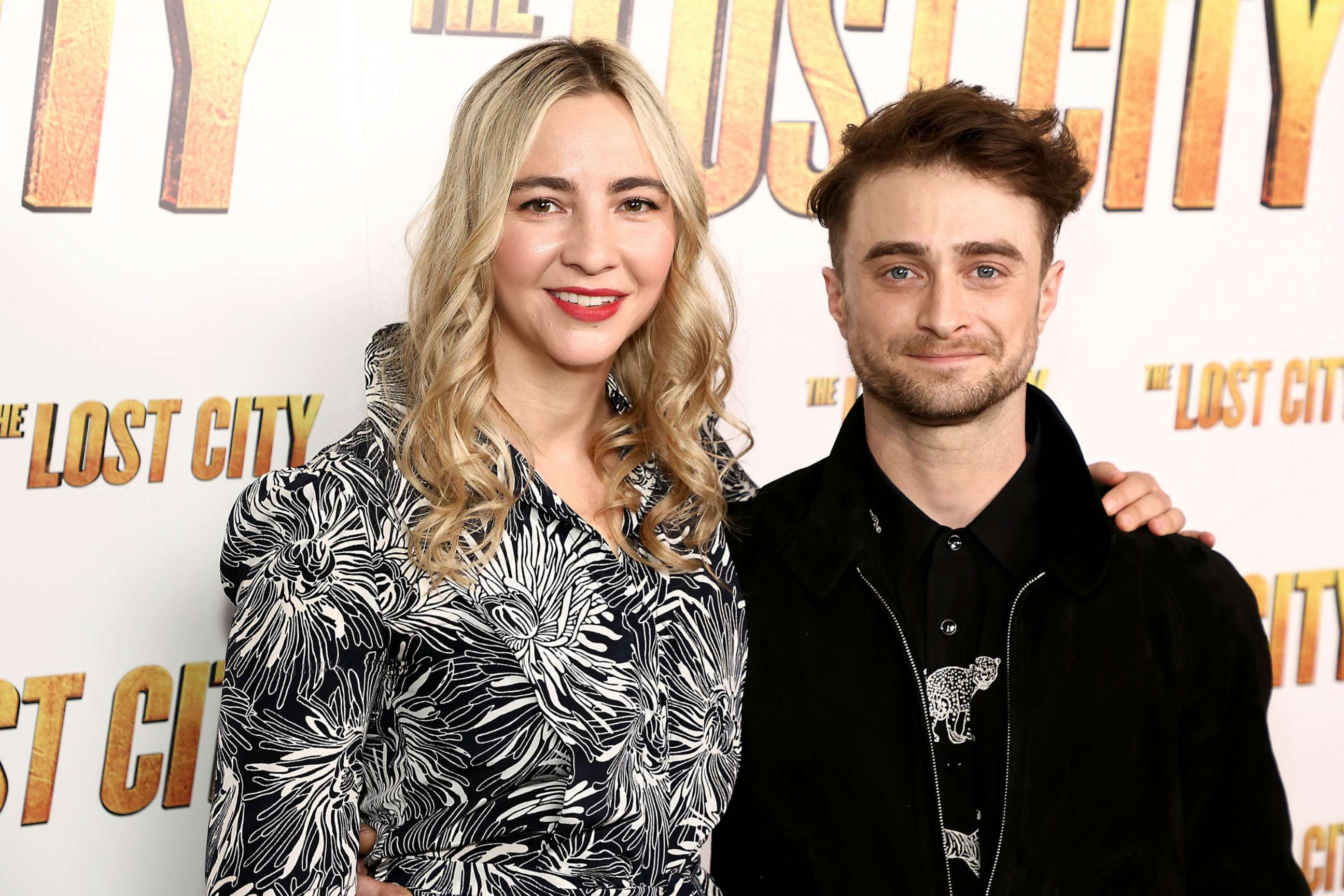 PHOTO: FILE - Erin Darke and Daniel Radcliffe attend a screening of "The Lost City" at the Whitby Hotel, March 14, 2022 in New York City.