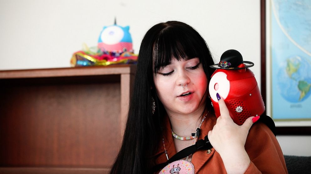PHOTO: Danielle Boyer demonstrates how her invention the SkoBot, which teaches children Indigenous languages, works.
