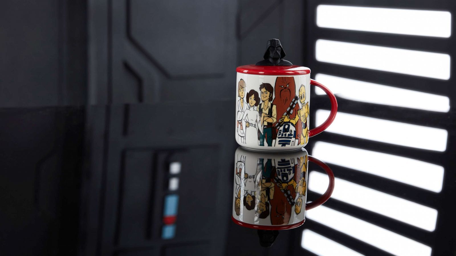 PHOTO: This mug features artwork of all of your favorite Star Wars characters and a Darth Vader lid.