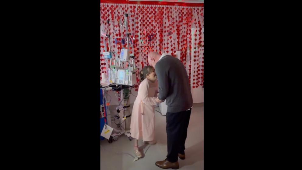 PHOTO: Dad brings the dance to his daughter awaiting a heart transplant in a Cleveland hospital.