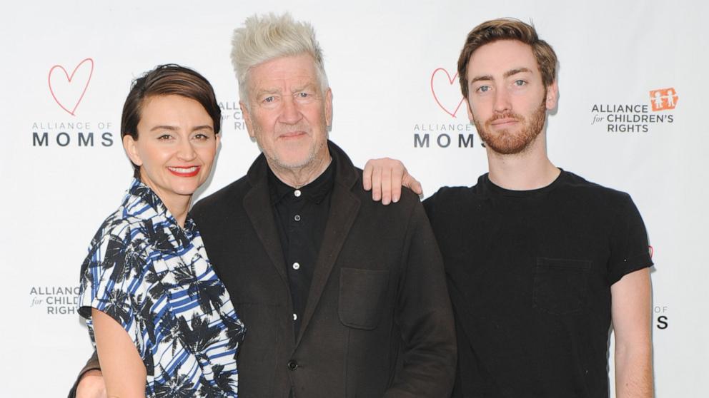 PHOTO: Actress Emily Lynch, director David Lynch and son Riley Lynch attend Alliance Of Moms Giant Playdate, May 9, 2015, in Los Angeles.