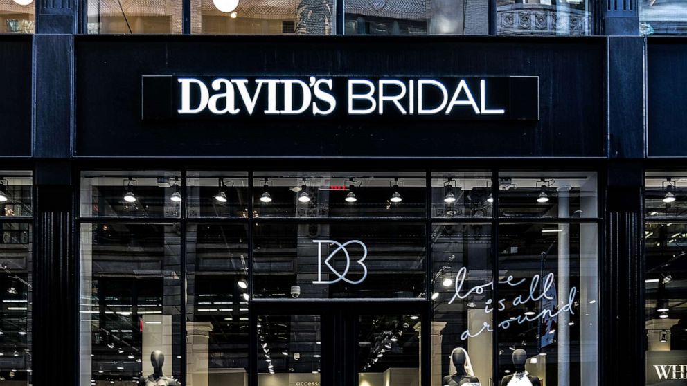PHOTO: A pedestrian passes in front of a David's Bridal Inc. store in New York, U.S., Nov. 14, 2018.