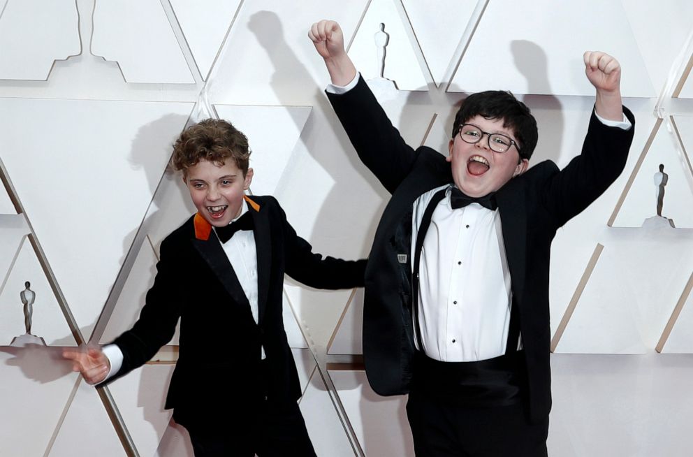 PHOTO: Roman Griffin Davis and Archie Yates react on the red carpet during the 92nd Academy Awards in Hollywood, Calif., Feb. 9, 2020.