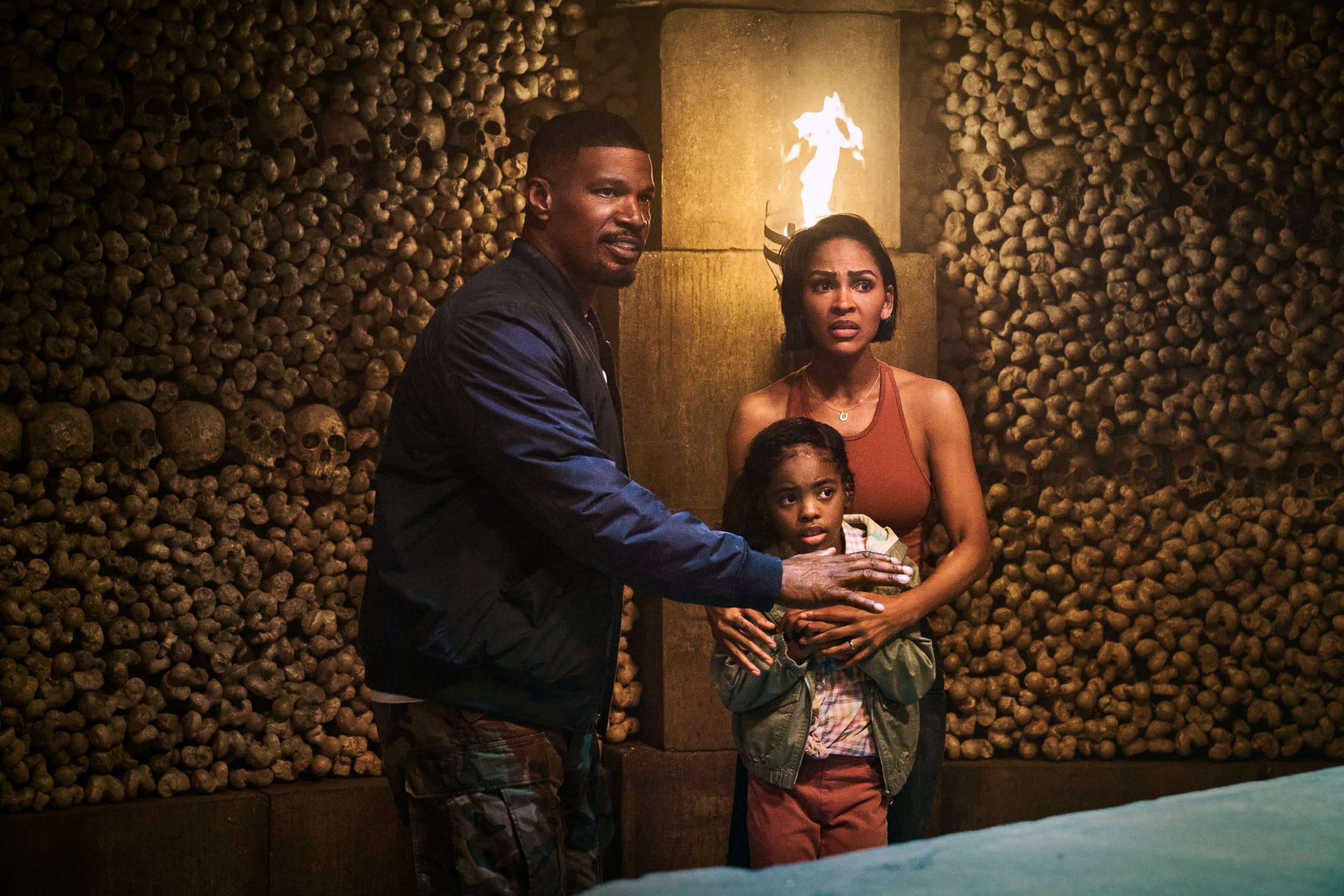 PHOTO: Jamie Foxx, as Bud, Zion Broadnax, as Paige, and Meagan Good, as Jocelyn, in Day Shift.