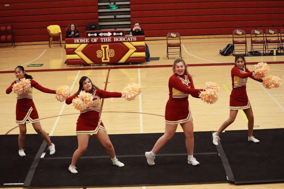PHOTO: (From left to right) Rifenta Kisichy, Brittany Adame, Kalista Nipper and Ashley Vera-Nieto are the four current members of the Iowa School for the Deaf cheer squad.