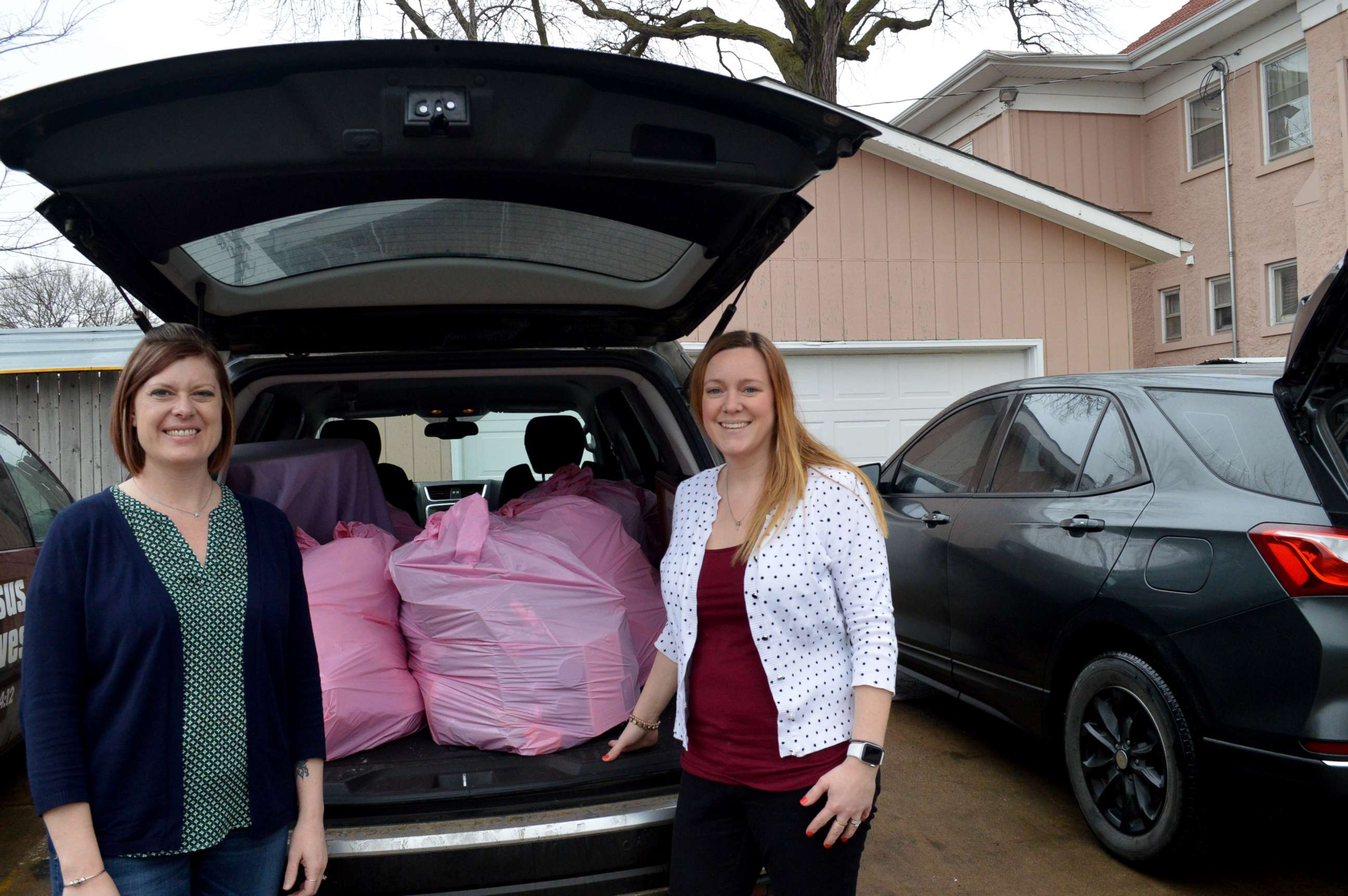PHOTO: Lynne Hilton, left, and Jenni DeWitt prepare to donate items from their homes.