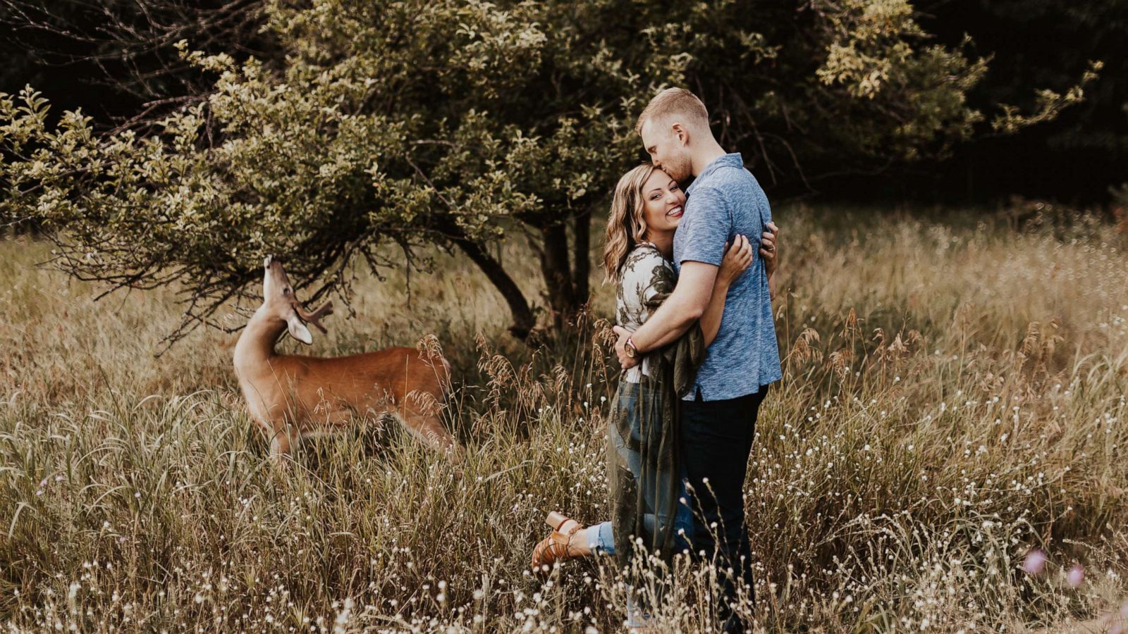 PHOTO: Austin Swiercz and Dori Castignola's engagement photos had an unexpected guest star: a photo-bombing deer.