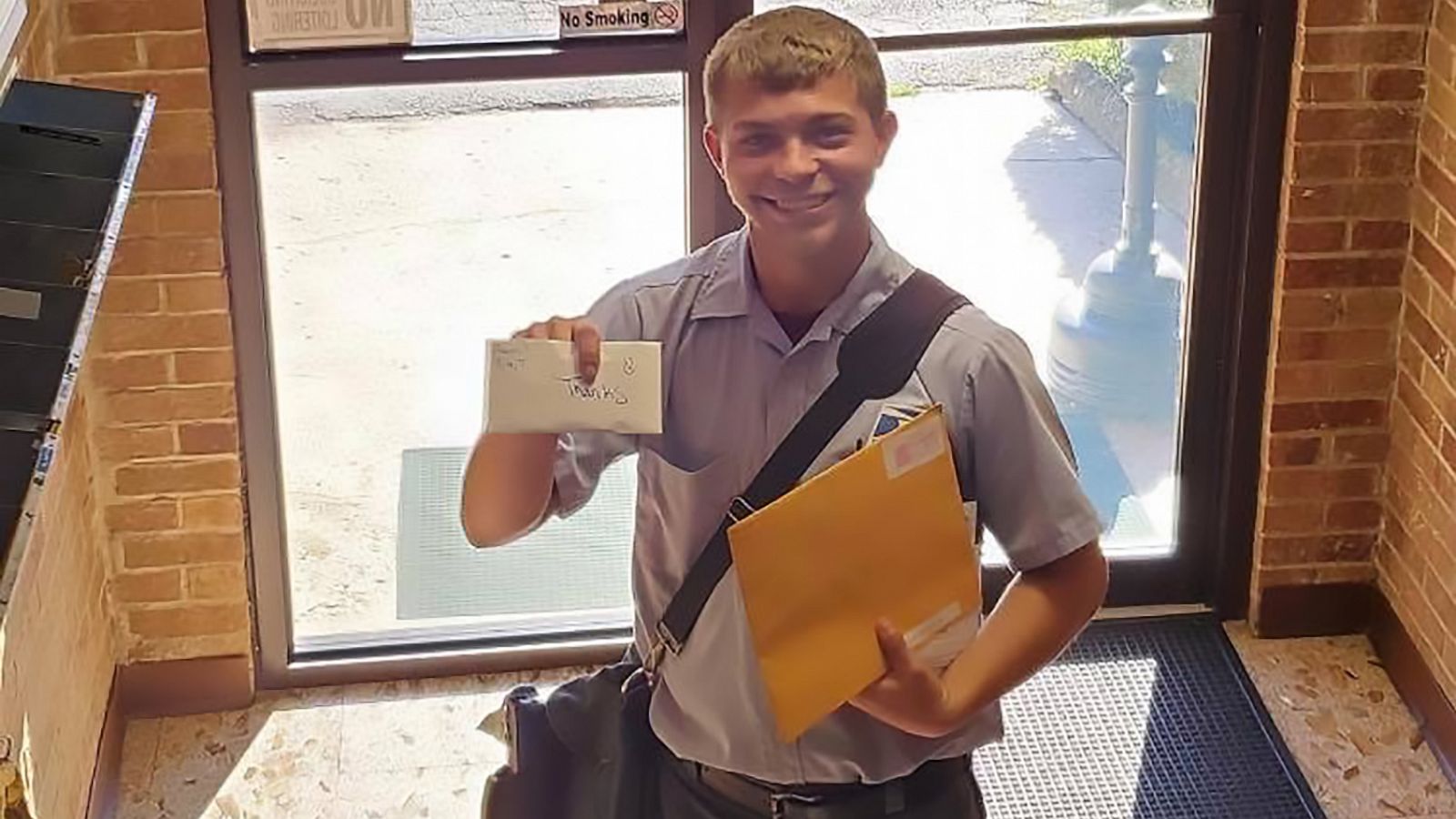 PHOTO: Kyle West, 23, dropped off letters on his mail route offering to deliver essential items to all 917 people he delivers to daily.