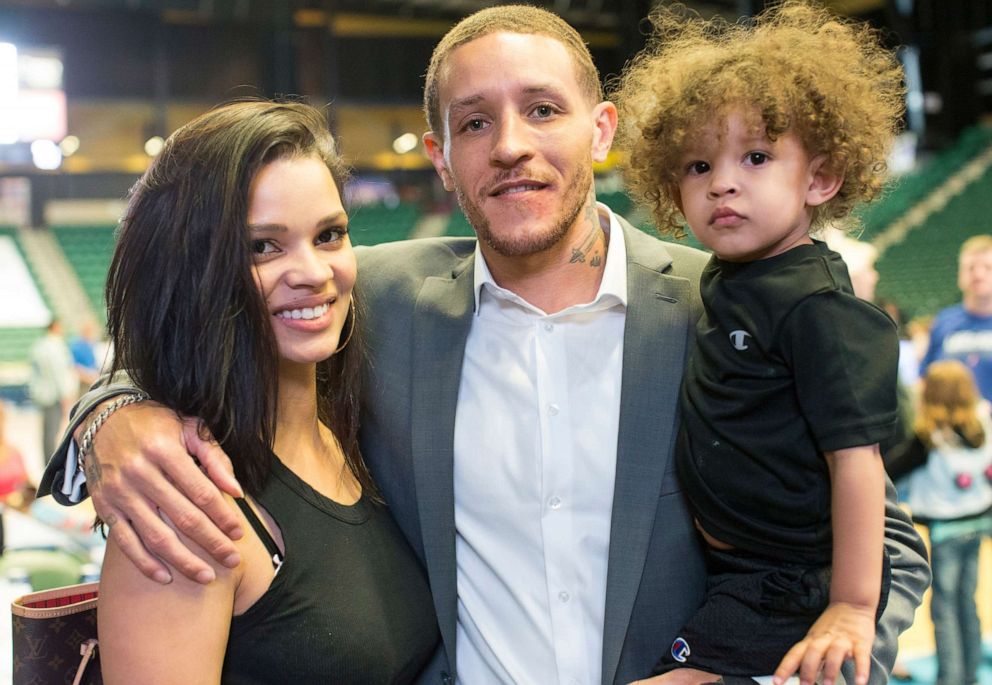 PHOTO: Delonte West poses with his wife Caressa and one of his children, Cash, in Frisco, Texas, April 1, 2015.