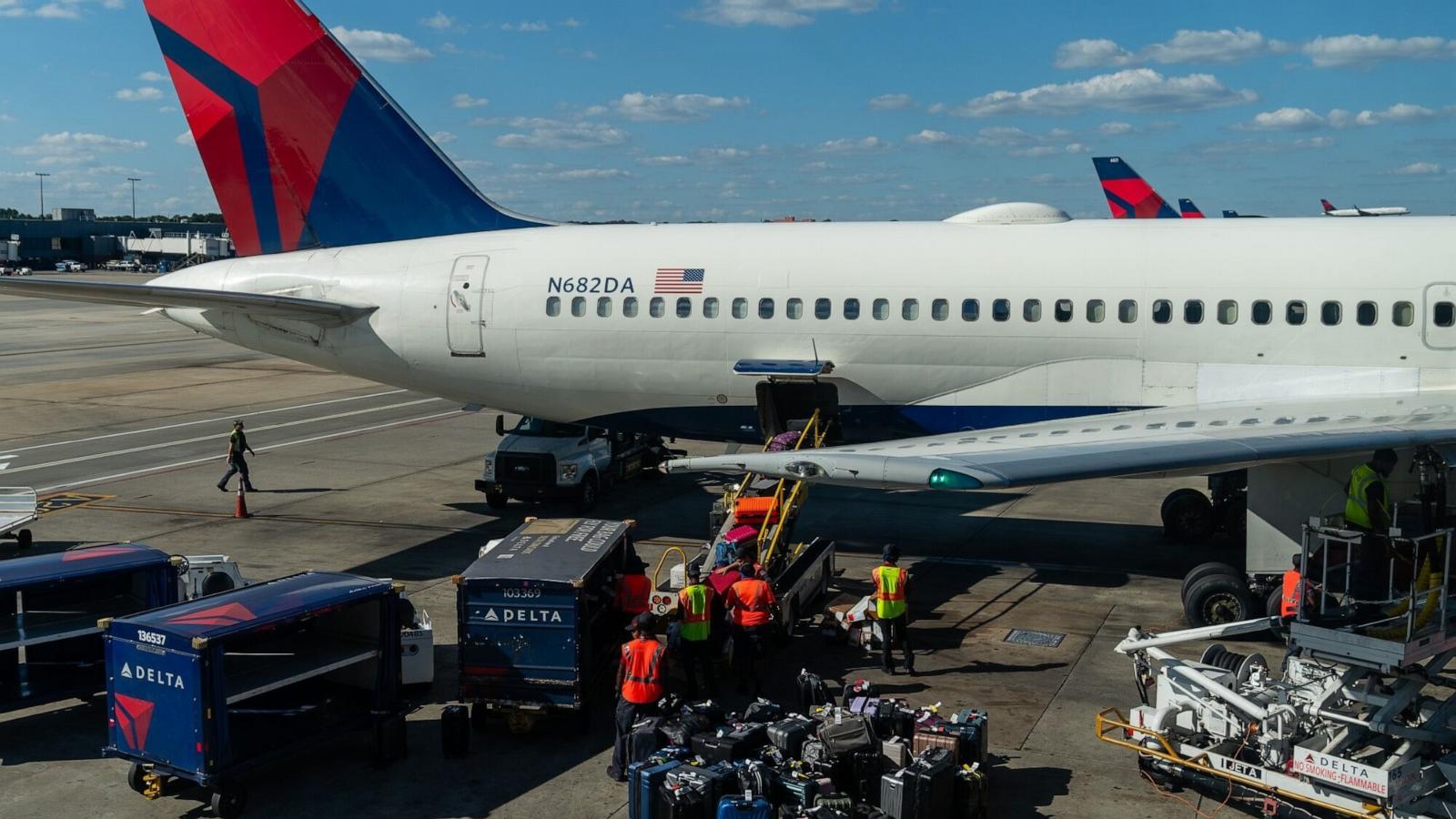 PHOTO: Ground crews load bags onto a Delta airplane at Hartsfield-Jackson Atlanta International Airport (ATL) in Atlanta, Oct. 2, 2023.