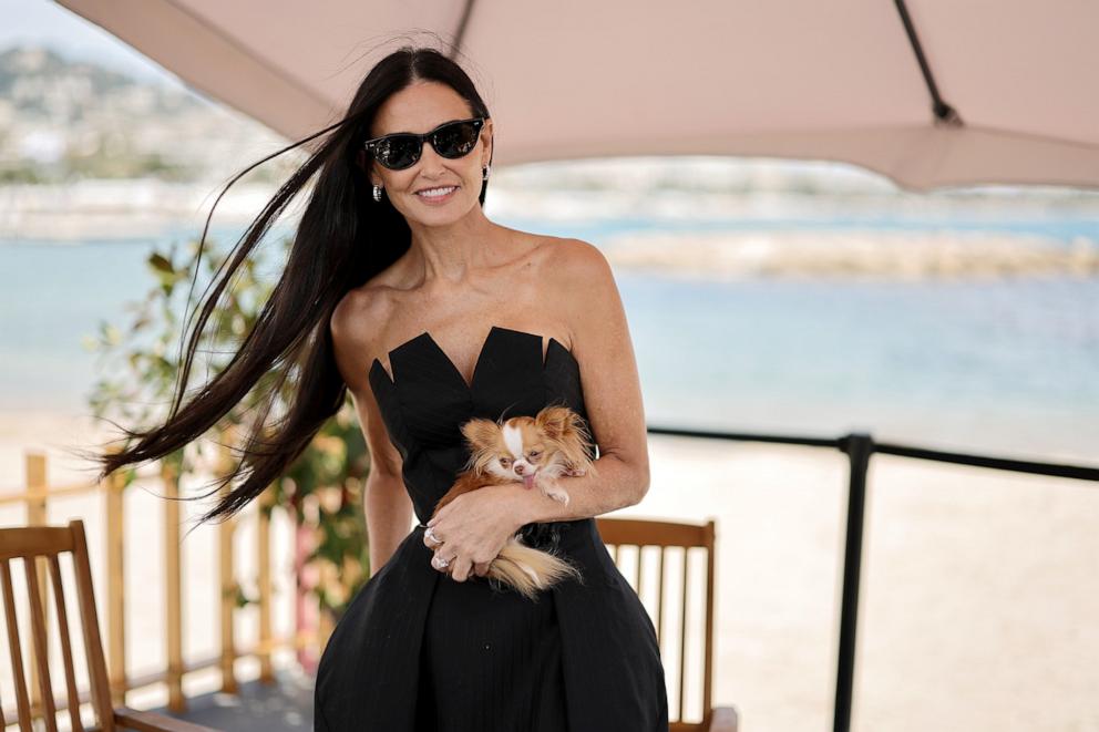 PHOTO: Demi Moore and her dog Pilaf attend a talk at the 77th annual Cannes Film Festival at American Pavillion, on May 19, 2024, in Cannes, France. 