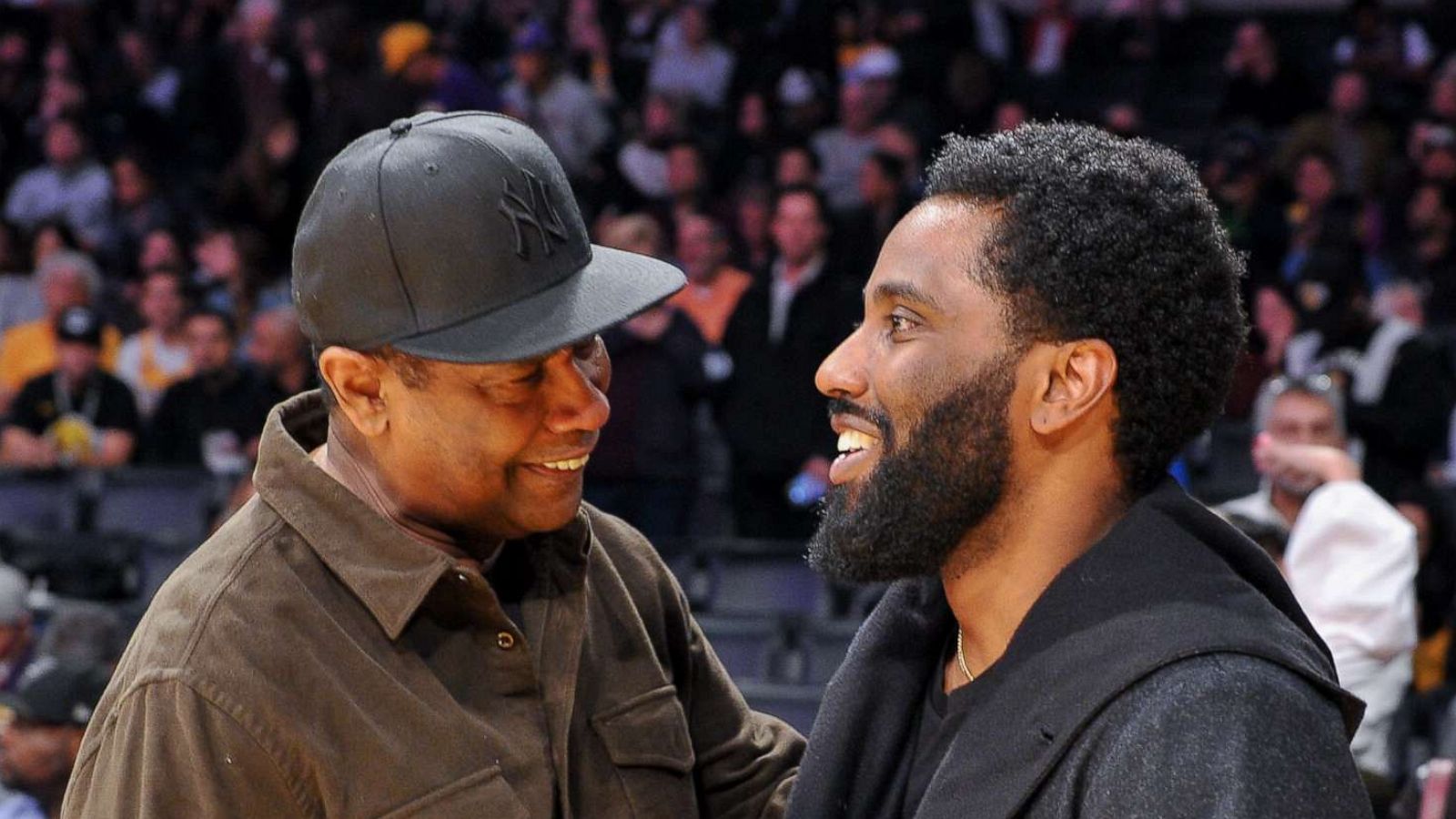 PHOTO: Denzel Washington and son John David Washington attend a basketball game between the Los Angeles Lakers and the San Antonio Spurs at Staples Center on Dec. 05, 2018, in Los Angeles.