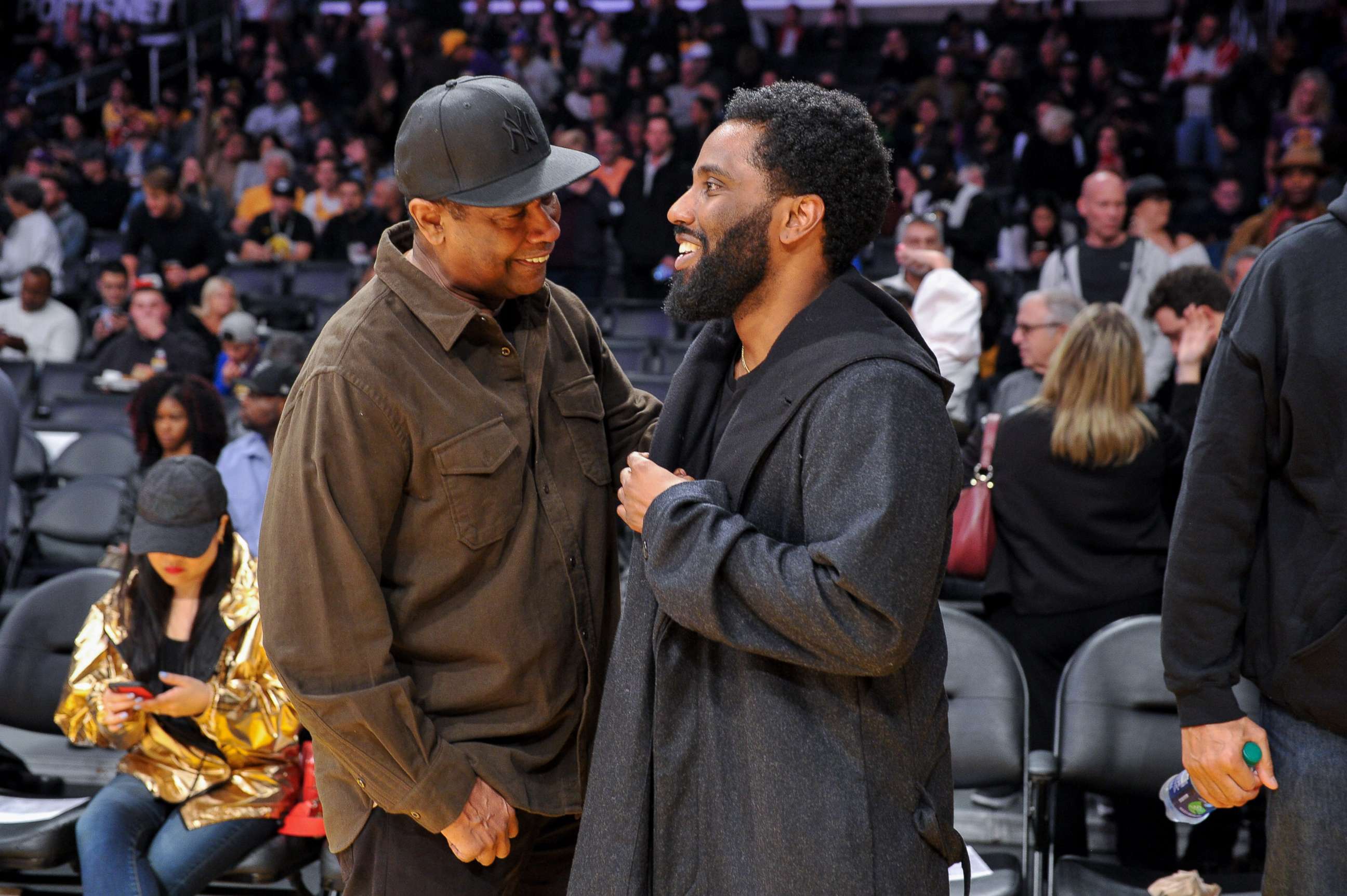 PHOTO: Actors Denzel Washington and son John David Washington attend a basketball game be at Staples Center on Dec. 5, 2018 in Los Angeles.