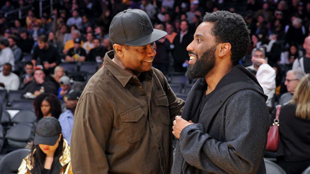 PHOTO: Actors Denzel Washington and son John David Washington attend a basketball game be at Staples Center on Dec. 5, 2018 in Los Angeles.