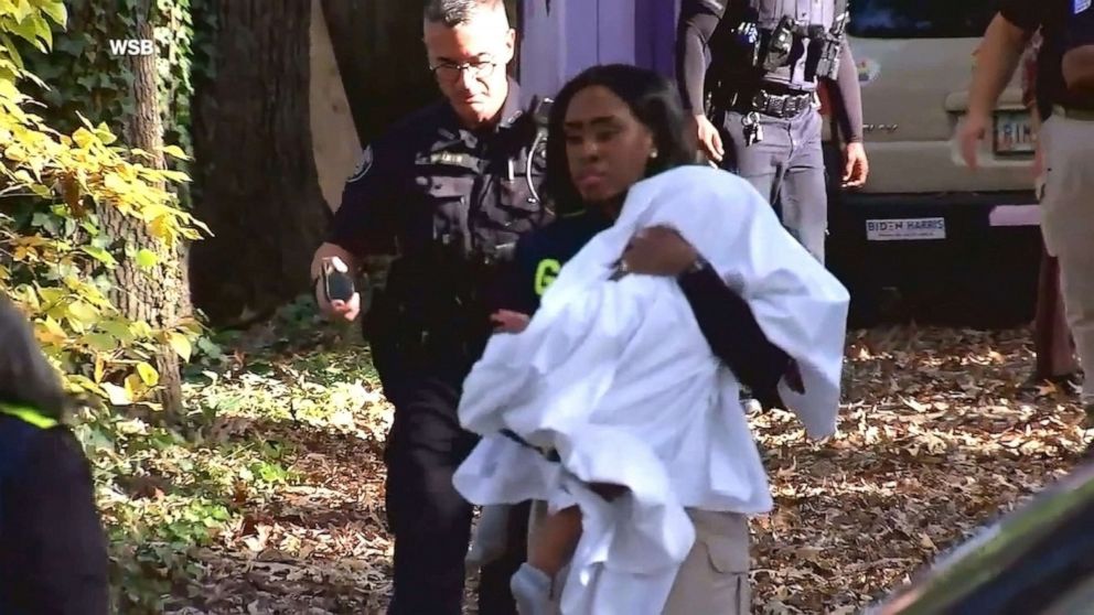 PHOTO: Authorities retrieve Deonna Bray's son after he was found within a mile of his home. 