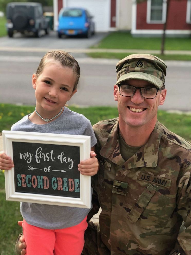 PHOTO: Staff Sergeant Philip Gray poses with his daughter, Rosie, 7, after returning home from Afghanistan. Gray wrote messages to Rosie just before leaving Fort Drum, New York on Oct. 7, 2019. The notes represented each day he expected to be deployed.