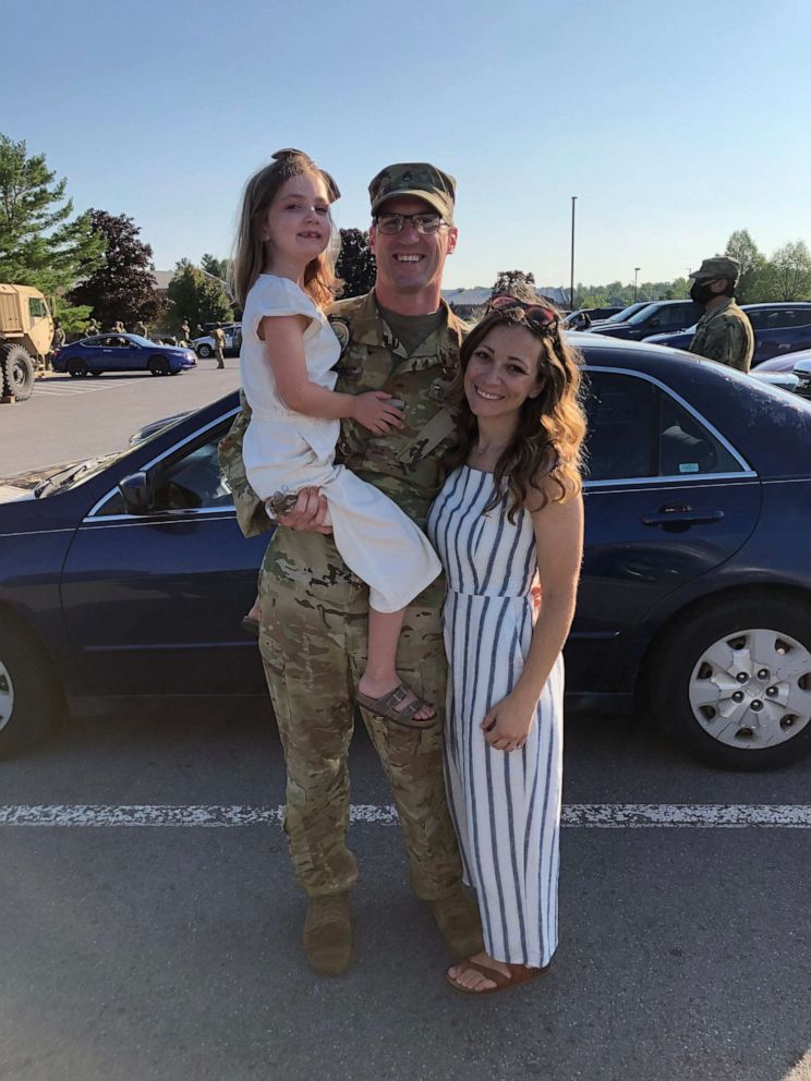 PHOTO: Staff Sergeant Philip Gray poses with his wife Kristen and daughter Rosie, 7, at Fort Drum, New York, on Aug. 8, 2020.