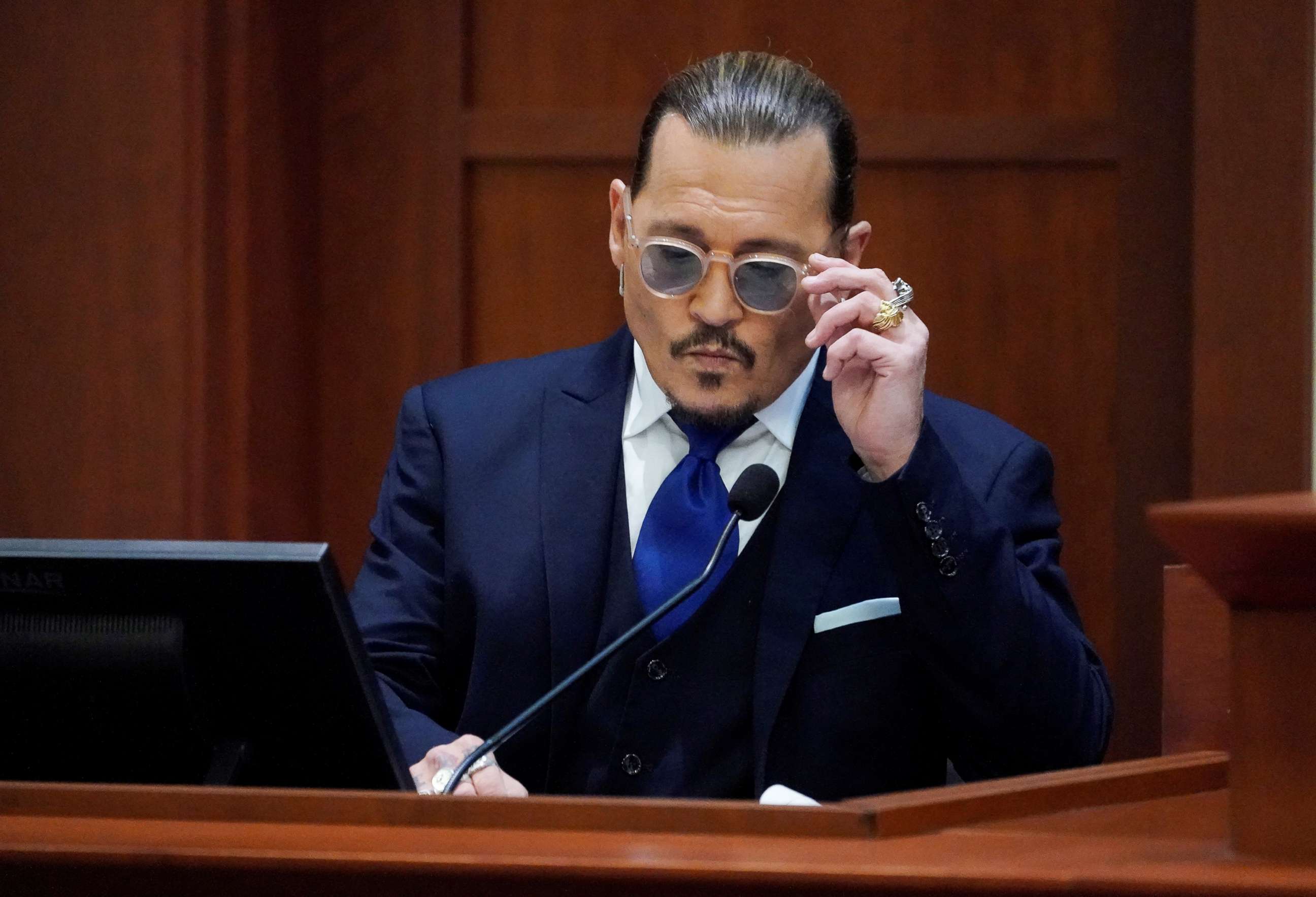 PHOTO: Actor Johnny Depp sits to testify in the courtroom at the Fairfax County Circuit Courthouse in Fairfax, Va., April 25, 2022.