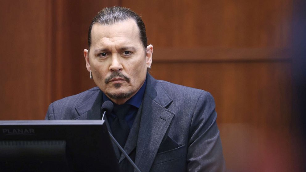 PHOTO: Actor Johnny Depp listens as he testifies in the courtroom at the Fairfax County Circuit Court in Fairfax, Va., April 21, 2022.