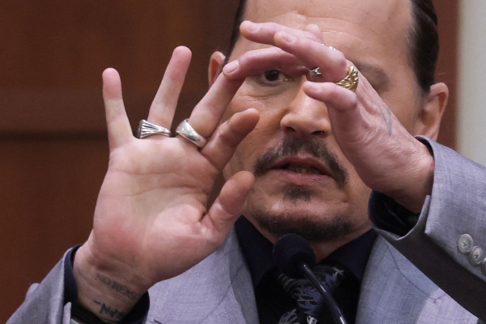 PHOTO: Actor Johnny Depp displays the middle finger of his hand, injured while he and his ex-wife Amber Heard were in Australia in 2015 during his defamation trial against Heard at the Fairfax County Circuit Courthouse in Fairfax, Va., April 20, 2022.