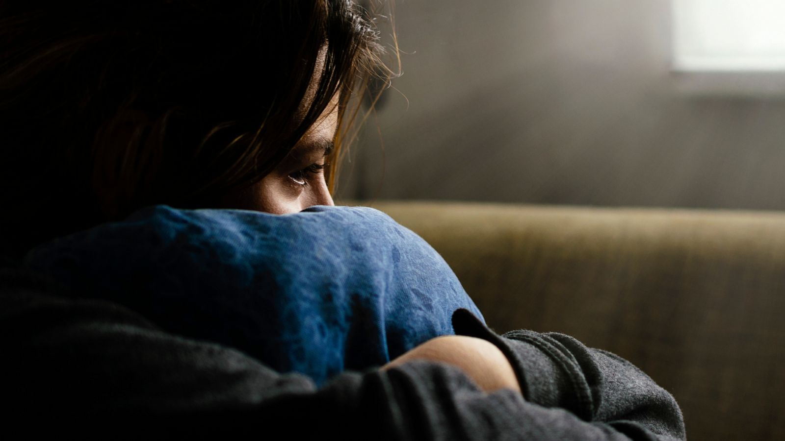 PHOTO: An undated stock photo depicts a sad person sitting near a window.