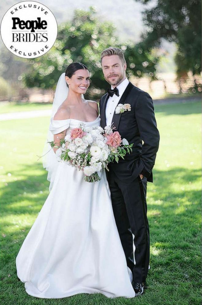 PHOTO: Hayley Erbert and Derek Hough pictured in their wedding outfits.