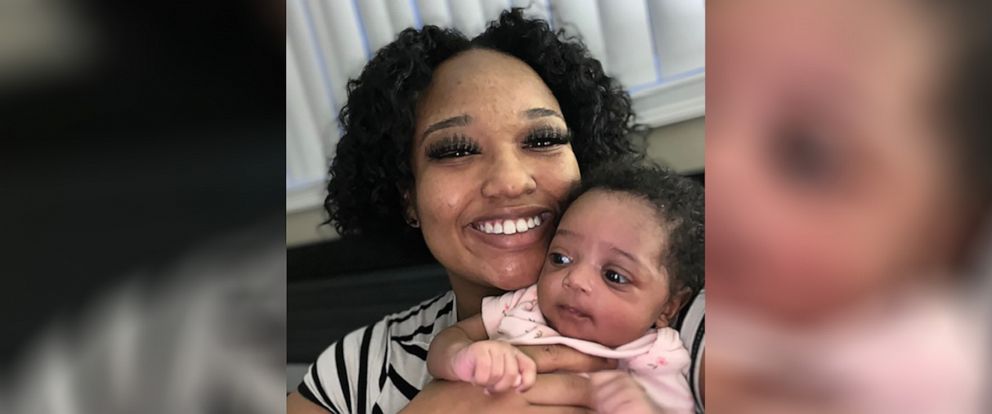 PHOTO: Mom Deshai Fudd smiles for a photo while holding her daughter Dariya.