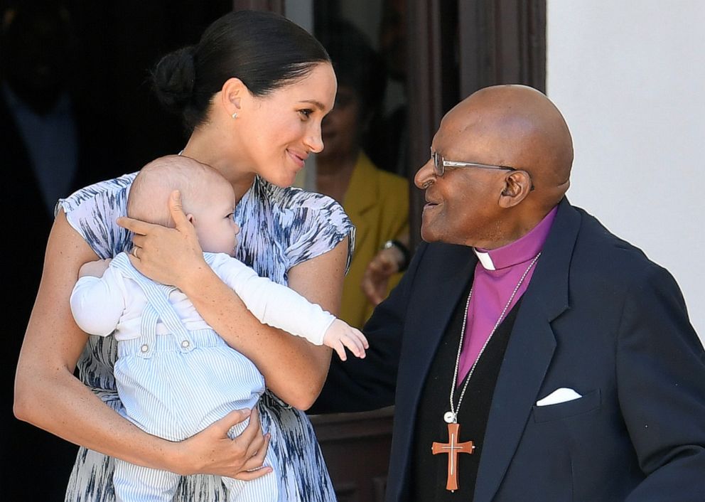 Meghan, Duchess of Sussex speaks to Archbishop Desmond Tutu while holding her son Archie Mountbatten-Windsor, during a visit to the Desmond & Leah Tutu Legacy Foundation during their royal tour of South Africa on Sept.25, 2019 in Cape Town, South Africa.