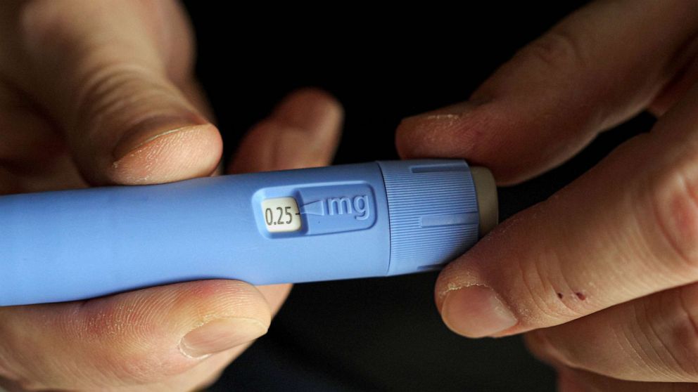 PHOTO: FILE - A man prepares Semaglutide Ozempic injection to control blood sugar levels