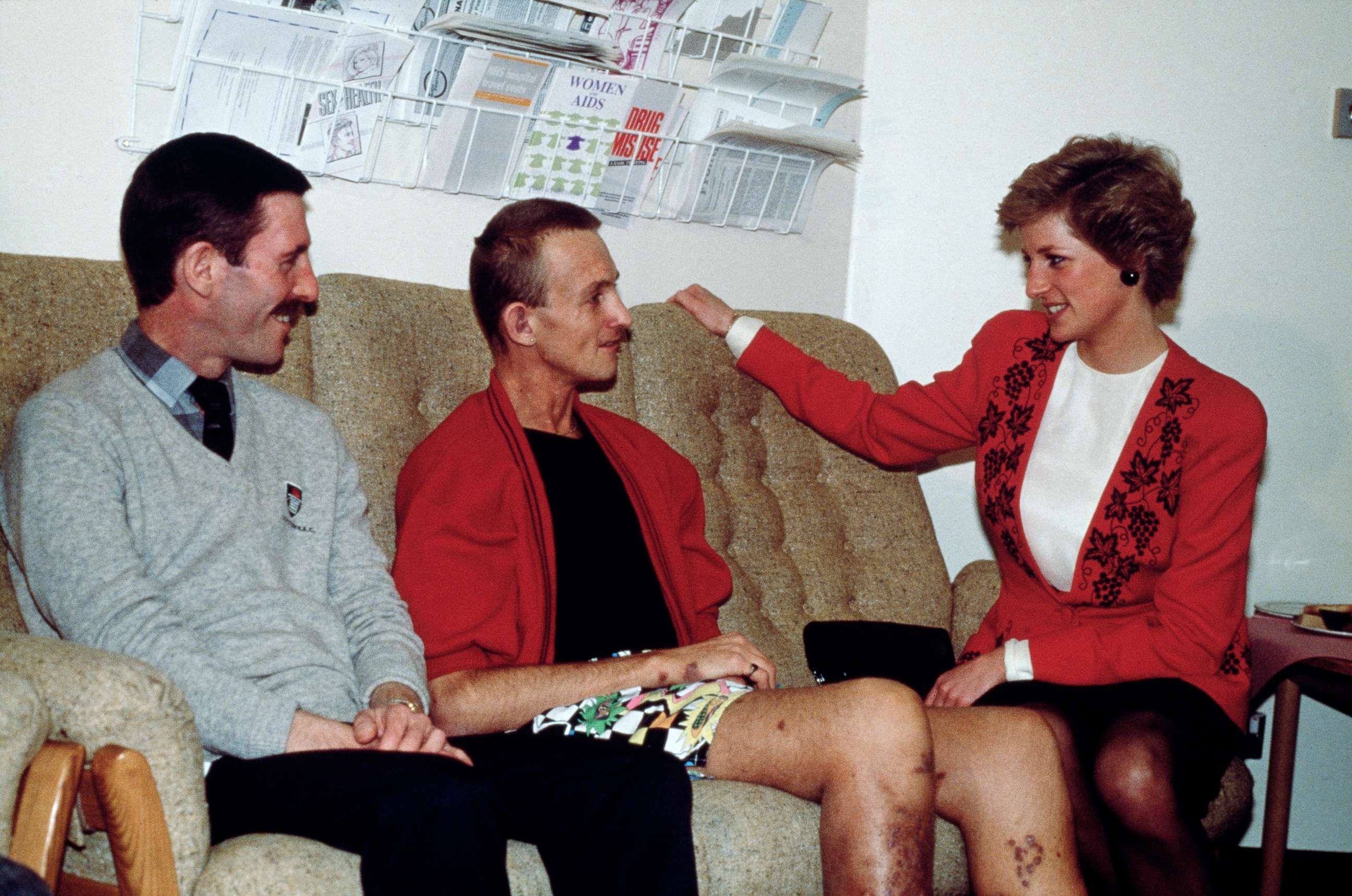 PHOTO: Diana, Princess of Wales, talks to patients in the AIDS unit of St Mary's Hospital, in London, in December of 1989.