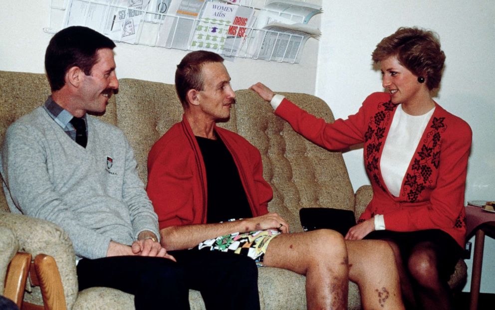 PHOTO: Diana, Princess of Wales, talks to patients in the AIDS unit of St Mary's Hospital, in London, in December of 1989.