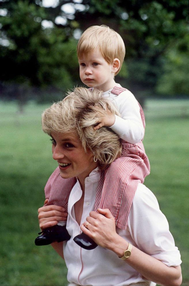 PHOTO: Princess Diana carries Prince Harry on her shoulders at Highgrove in Tetbury, U.K., July 18, 1986.