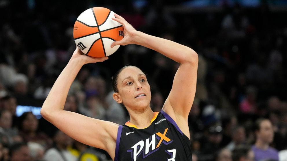 PHOTO: In this Sept. 19, 2024, file photo, Phoenix Mercury guard Diana Taurasi looks to pass the ball against the Seattle Storm during the first half of a WNBA basketball game in Phoenix. 