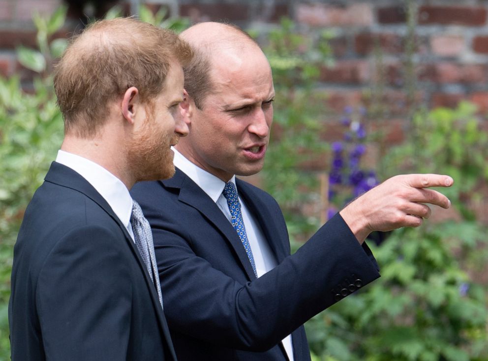 PHOTO: Britain's Prince William and Prince Harry gesture, during the unveiling of a statue they commissioned of their mother  Princess Diana,  on what would have been her 60th birthday, in the Sunken Garden at Kensington Palace, London, July 1, 2021.