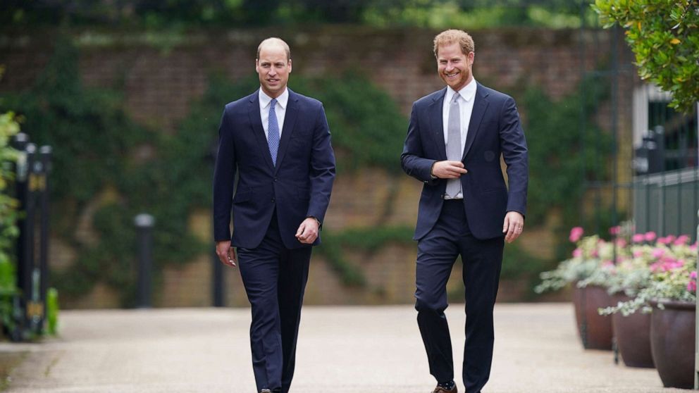 PHOTO: Britain's Prince William and Prince Harry arrive for the statue unveiling on what would have been Princess Diana's 60th birthday, in the Sunken Garden at Kensington Palace, London, July 1, 2021.