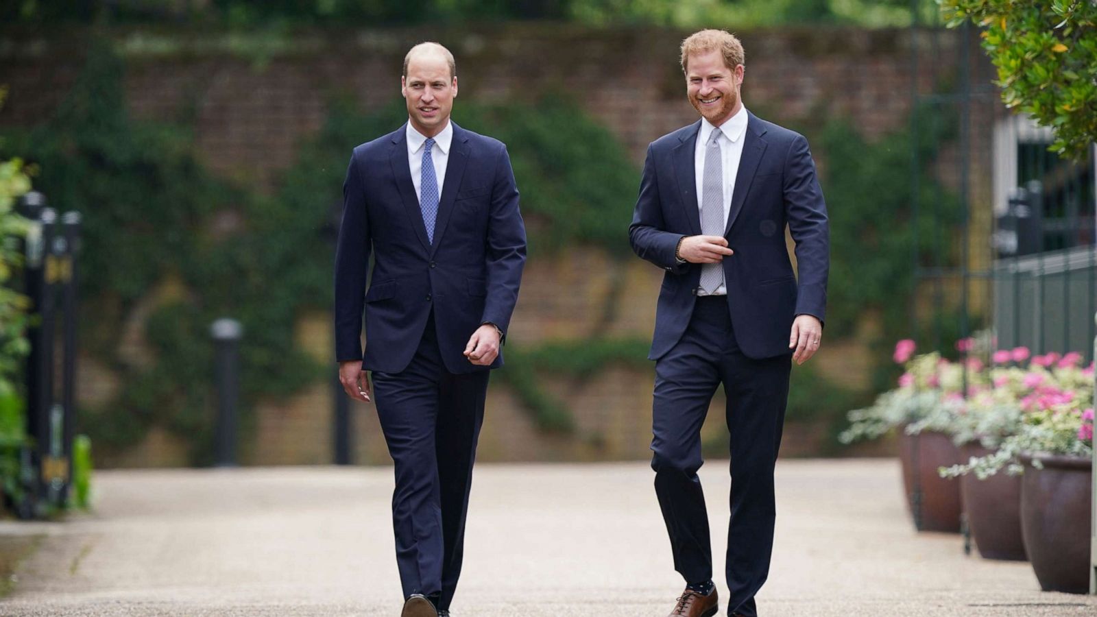 PHOTO: Britain's Prince William and Prince Harry arrive for the statue unveiling on what would have been Princess Diana's 60th birthday, in the Sunken Garden at Kensington Palace, London, July 1, 2021.