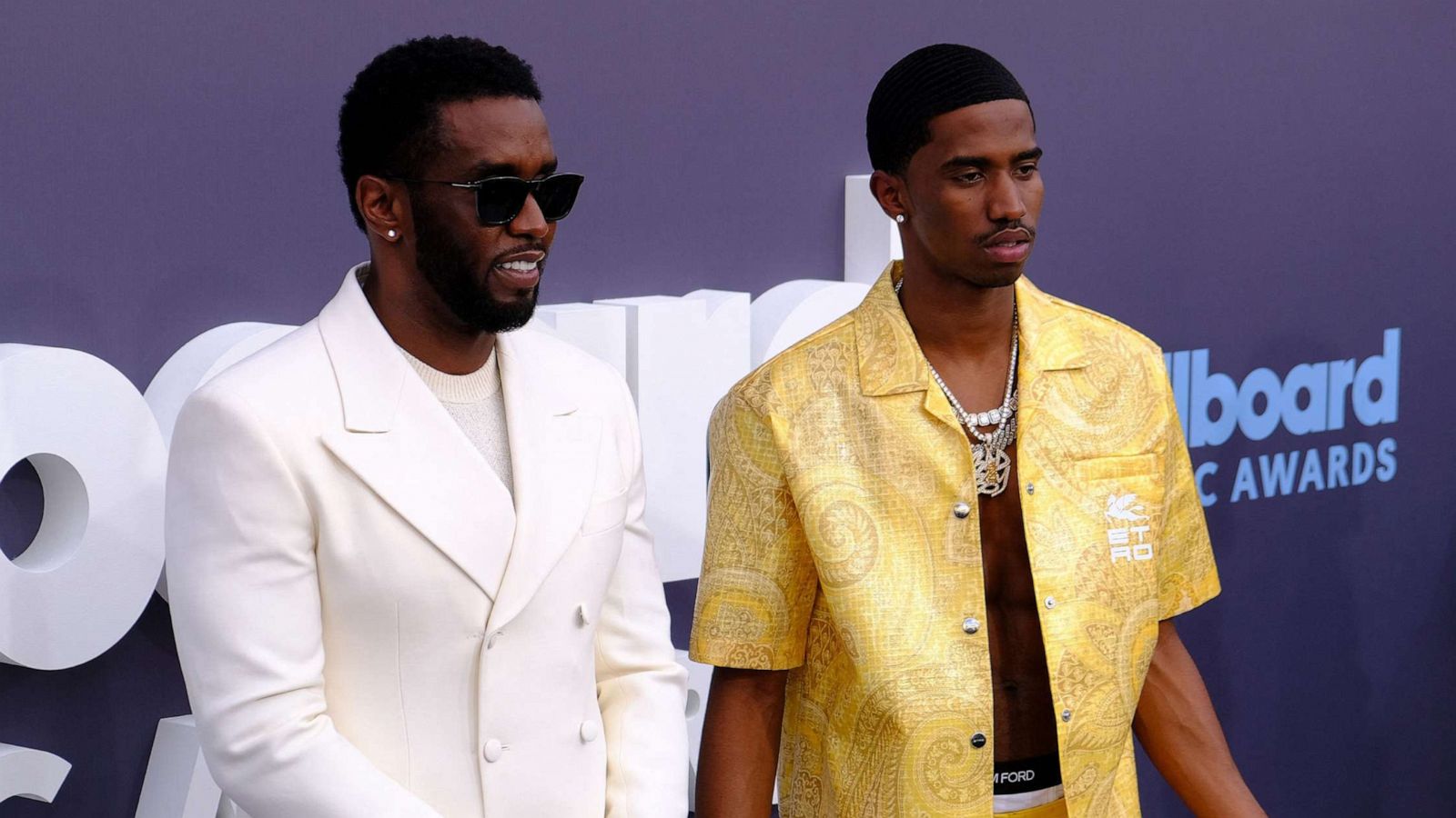 PHOTO: Producer-musician Sean "Diddy" Combs, left, and his son Christian Combs attend the 2022 Billboard Music Awards at the MGM Grand Garden Arena in Las Vegas, May 15, 2022.