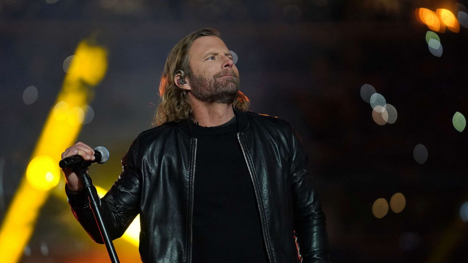 PHOTO: Dierks Bentley performs onstage during and intermission of the game between Tampa Bay Lightning and the Nashville Predators at Nissan Stadium on Feb. 26, 2022 in Nashville, Tenn.