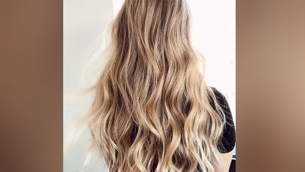 In this image posted to Dina DiPietro's Instagram account, a hairstyle of beachy waves is shown.