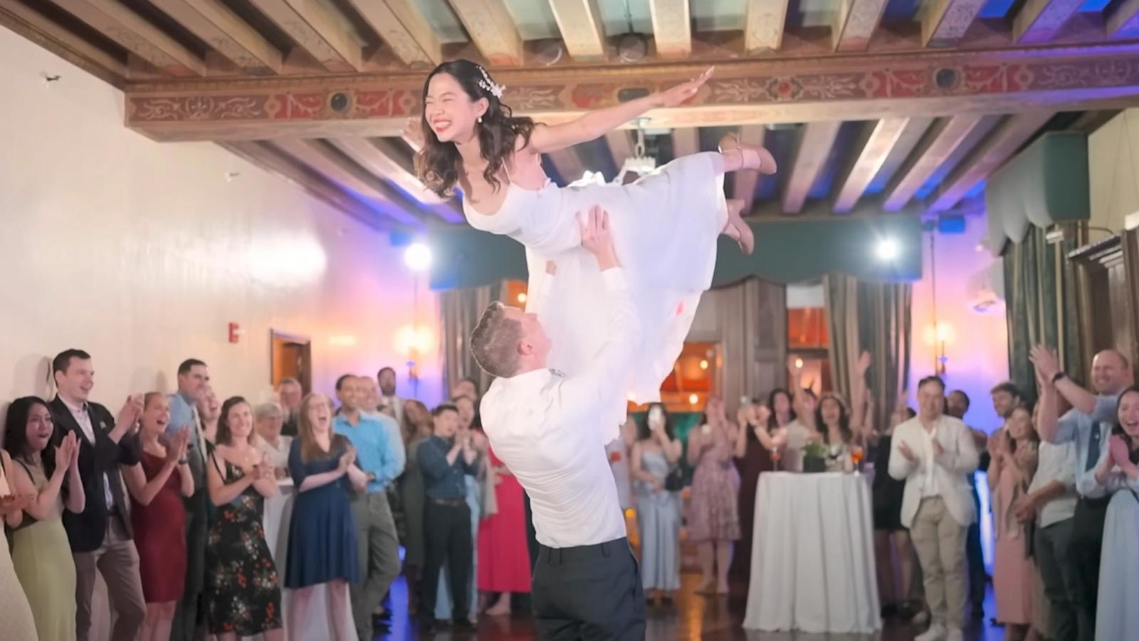 PHOTO: Chris and Lan Donais re-creating the famous lift movie from “Dirty Dancing” at their August 2024 wedding reception.