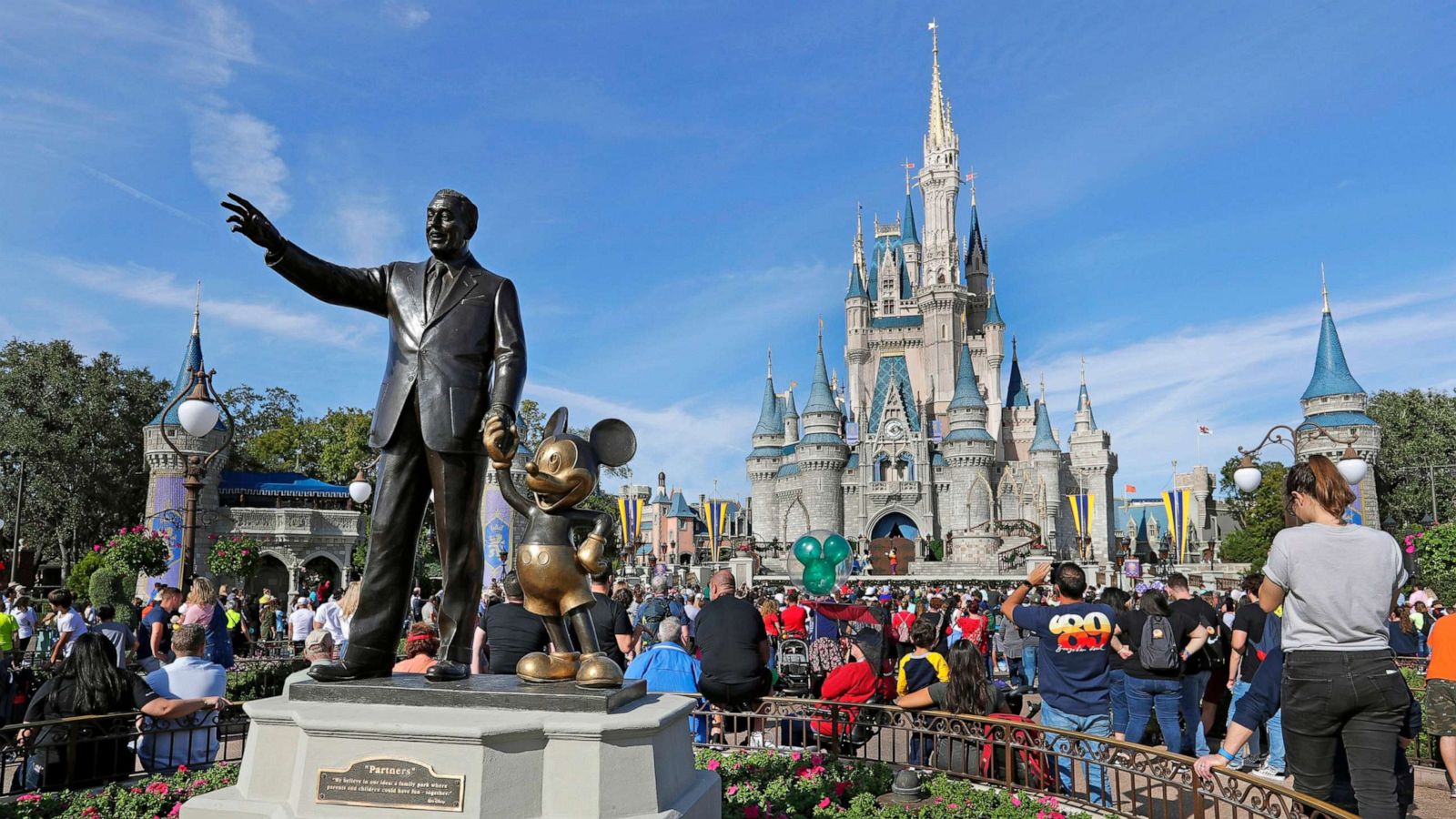 PHOTO:Guests watch a show near a statue of Walt Disney and Micky Mouse in front of the Cinderella Castle at the Magic Kingdom at Walt Disney World in Lake Buena Vista, part of the Orlando area in Fla., Jan. 9, 2019.