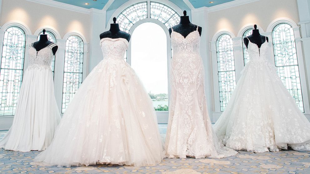 PHOTO: Disney and Allure Bridals' 2021 bridal line of their Jasmine, Belle, Tiana and Snow White dresses.