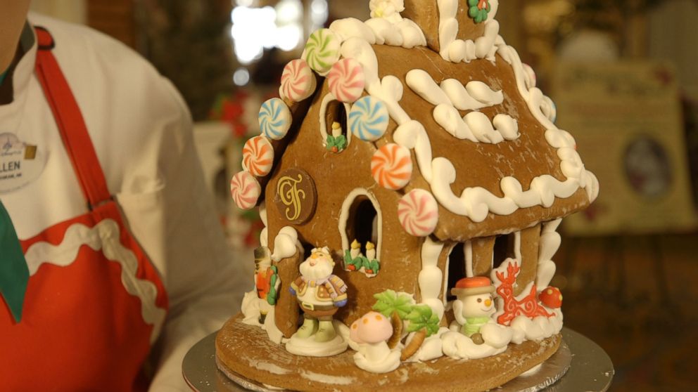 PHOTO: Ellen DiGiovanni, known as 'Disney's Gingerbread Lady' decorates gingerbread houses at Walt Disney World's Grand Floridian Resort and Spa in Orlando, Fla.,. December 2018.