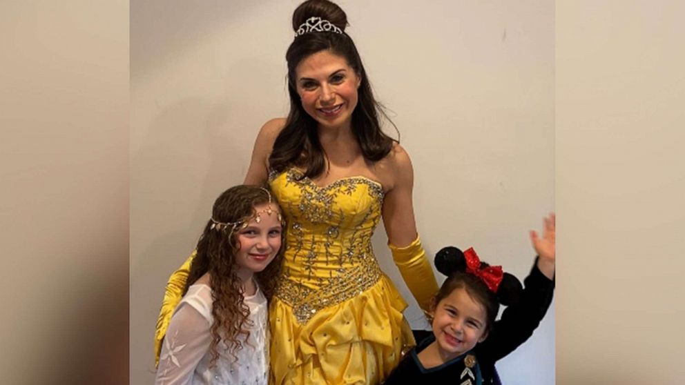 PHOTO: Jessica Gubenko and daughters Sadie, 8, and Summer, 4, from Long Island, N.Y., dress up in costumes at home after their Disney World vacation was canceled due to coronavirus.