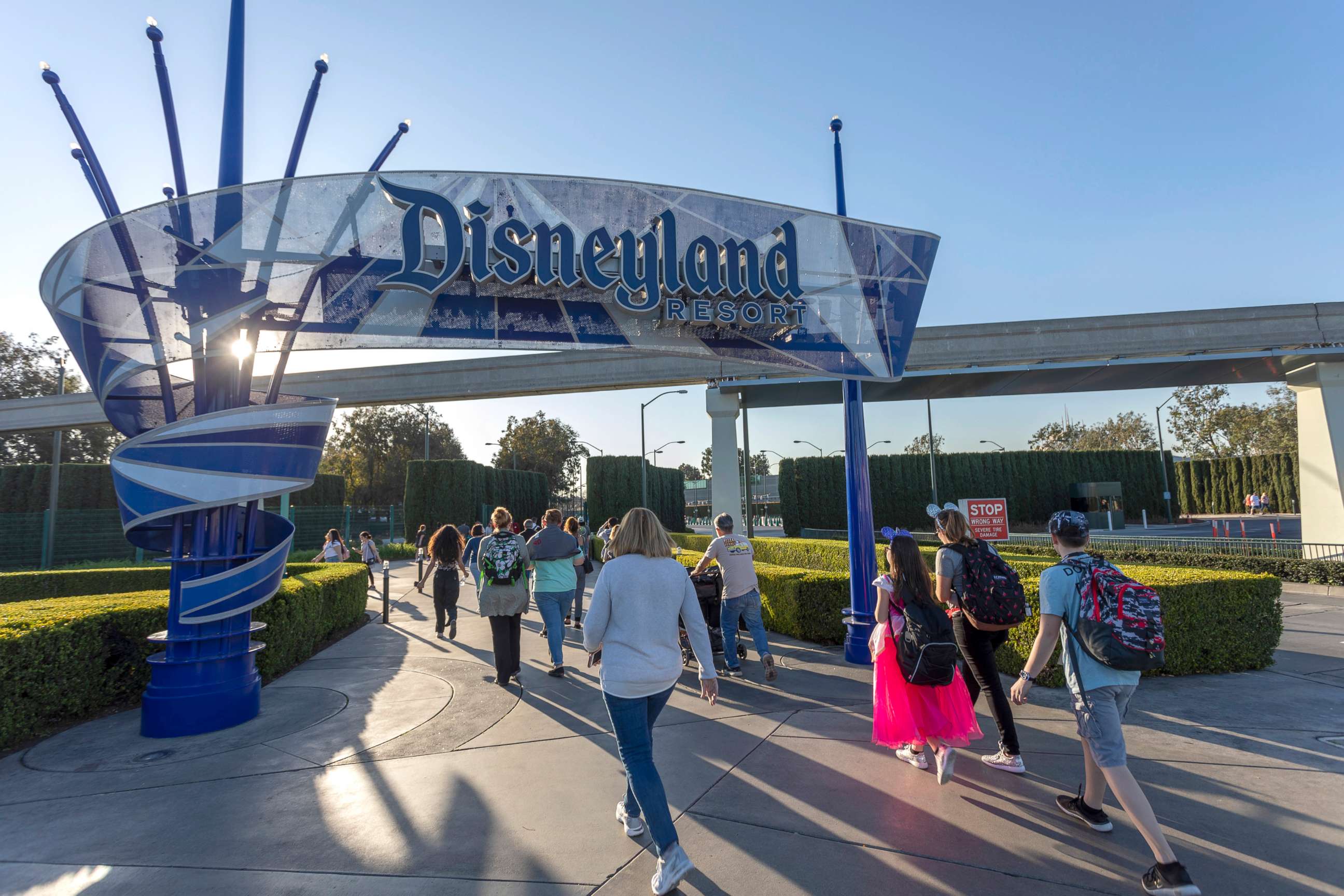 PHOTO: Visitors attend Disneyland Park on February 25, 2020 in Anaheim, California.
