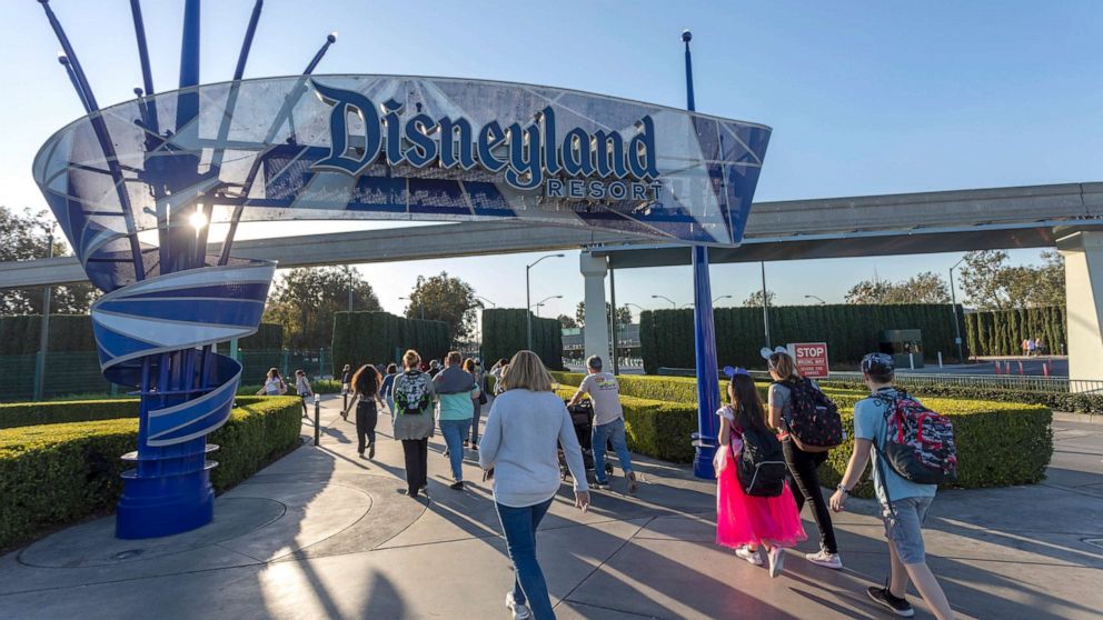 PHOTO: Visitors attend Disneyland Park on February 25, 2020 in Anaheim, California.