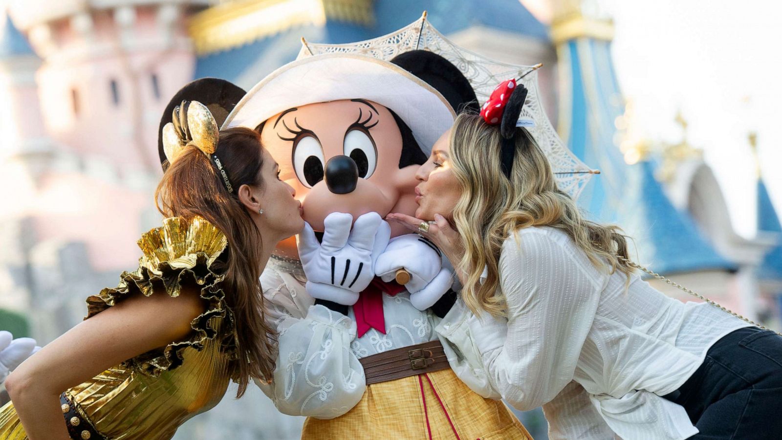 PHOTO: Isabeli Fontana and Candice Swanepoel with Minnie Mouse at Disneyland Paris.