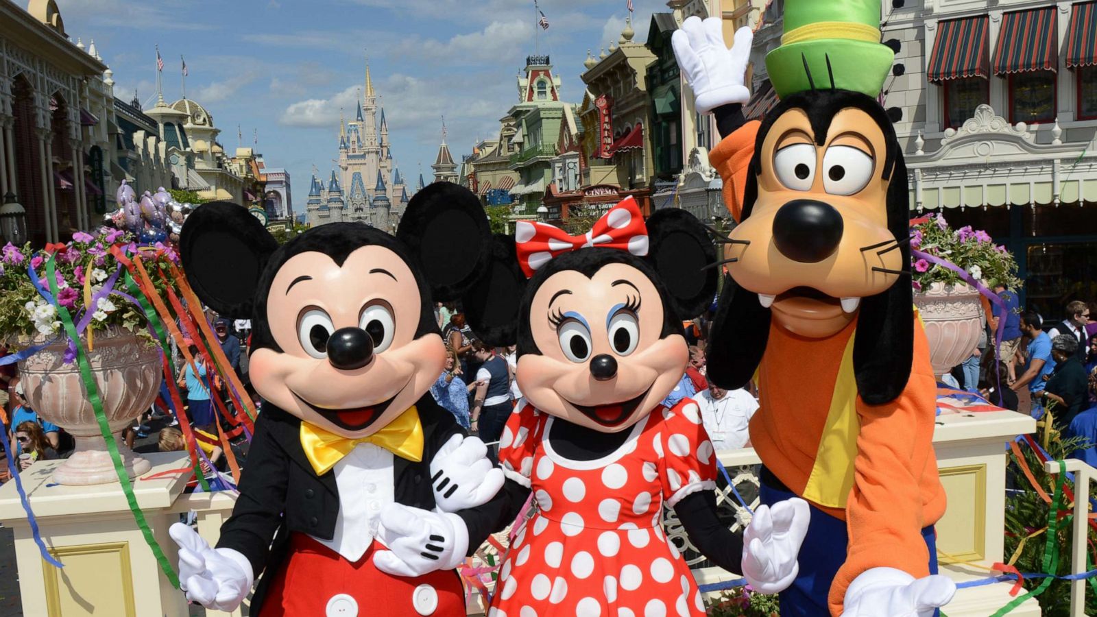 PHOTO: Mickey Mouse, Minnie Mouse and Goofy at Magic Kingdom at the Walt Disney World Resort in Orlando, Fla.